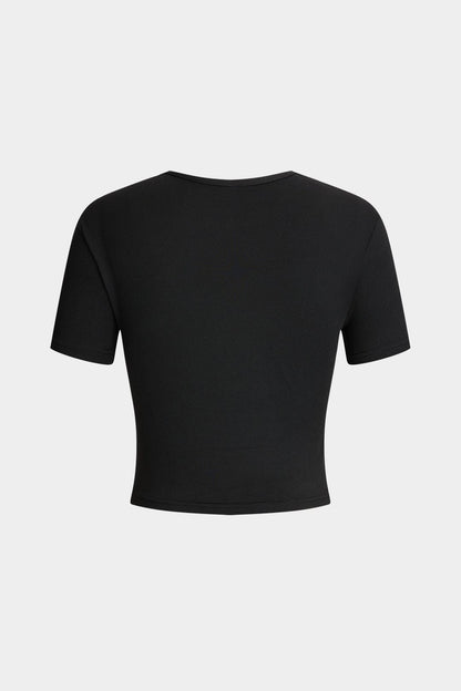 Braelyn™ | Schwarz Kurzarm Cropped T-Shirt mit "Wees Niet Jalours"-Print